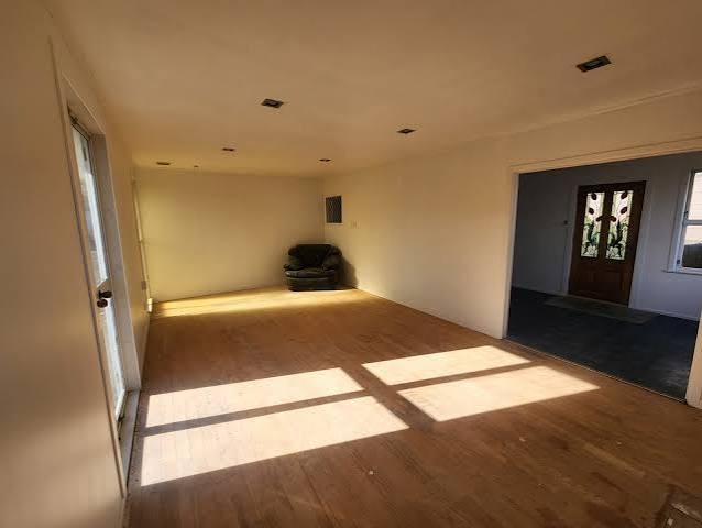 Sanding floorboards in a 1960s Frankston house