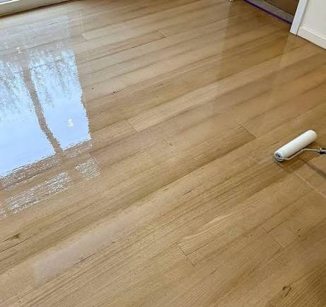 Solvent-Based Polyurethane being applied to a timber floor