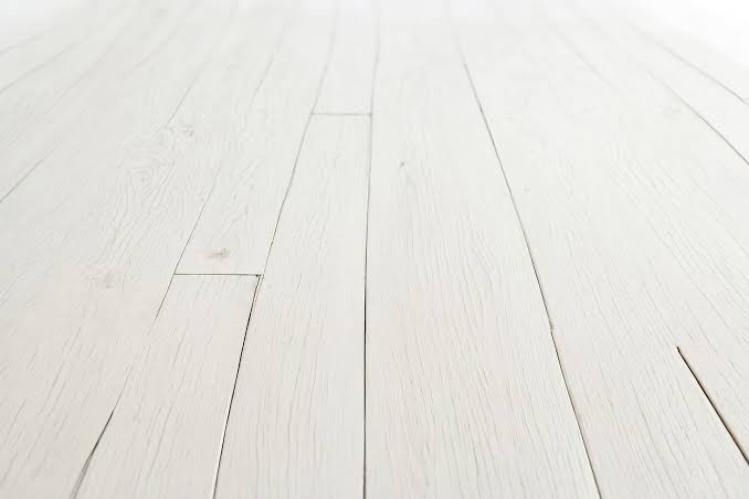 Lime Wash & Whitewash Floors in progress on a timber floor