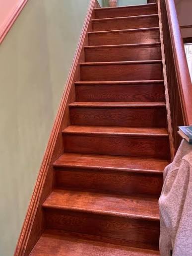 Staircase Sanding & Polishing in progress on a timber floor